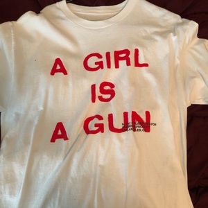 A Girl is a gun tee by pleasures